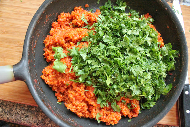 Mince the stems of your parsley and cilantro and chop the leaves. Add both to the stuffing and stir well.