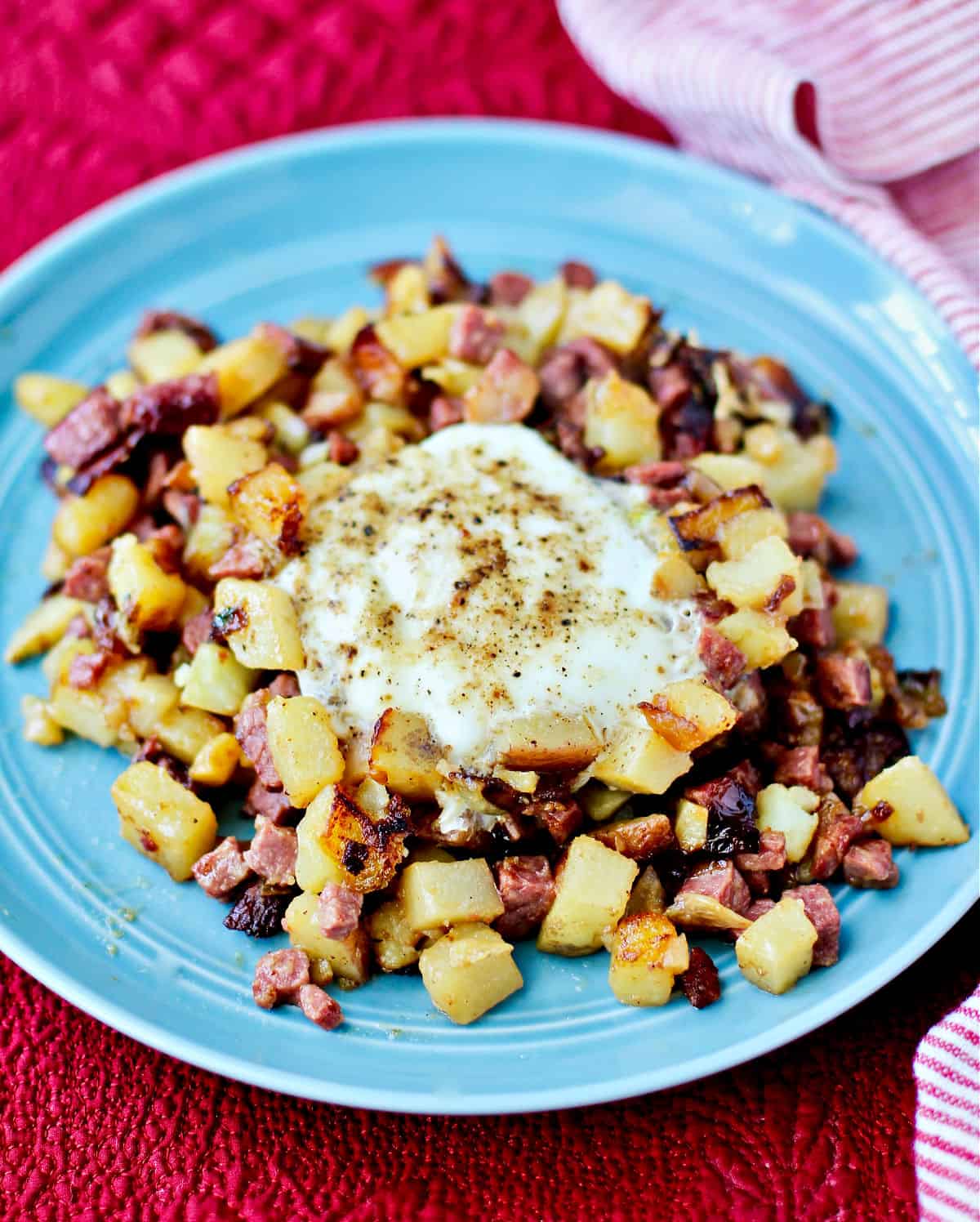 Corned Beef Hash with Yukon Gold Potatoes and Chiles on a plate.
