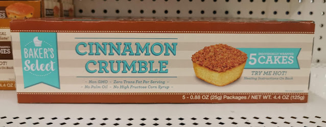 Box of Baker's Select Cinnamon Crumble Cakes sitting on a Dollar Tree shelf.