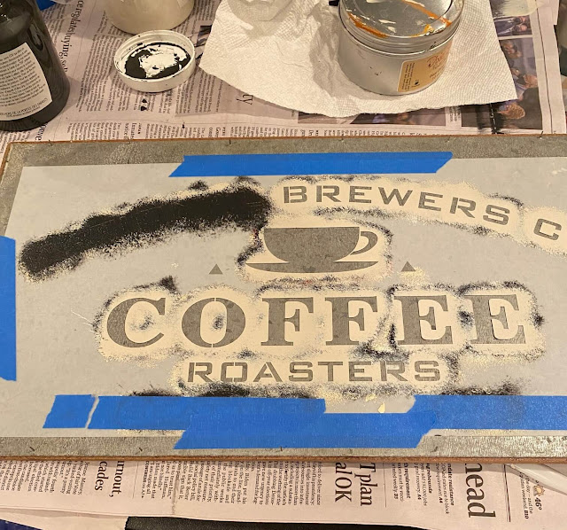 Photo of a National Brewers Coffee Roasters stencil from Old Sign Stencils being pounced on with Fusion Mineral Paint.