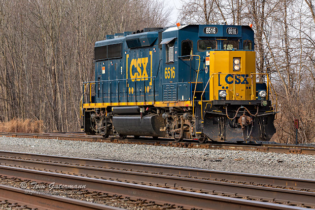 CSXT 6516 is back on the Jordan Industrial track and is backing toward its string of cars