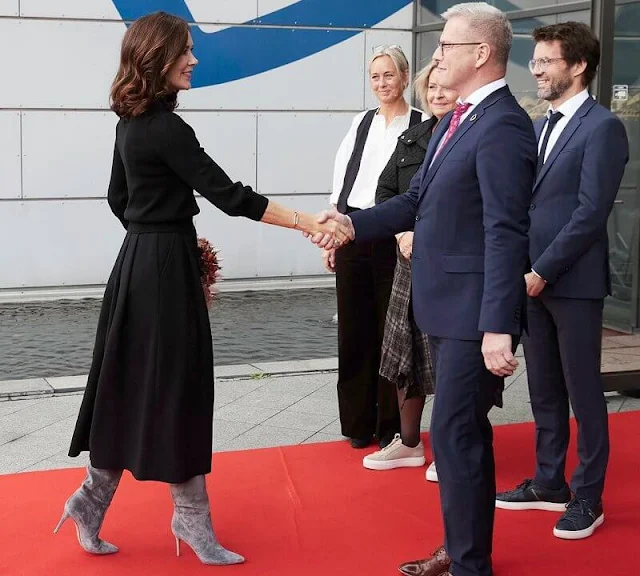 Crown Princess Mary wore a wool sweater by Co. Dulong delphis earrings and esme bracelet. Rebekka Notkin bracelet