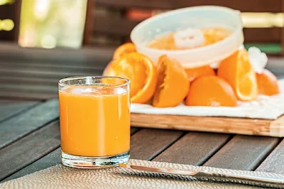 orange juice for healthy hairs - women steps