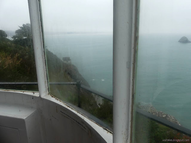 03: wooden building and cliff and a stack far out