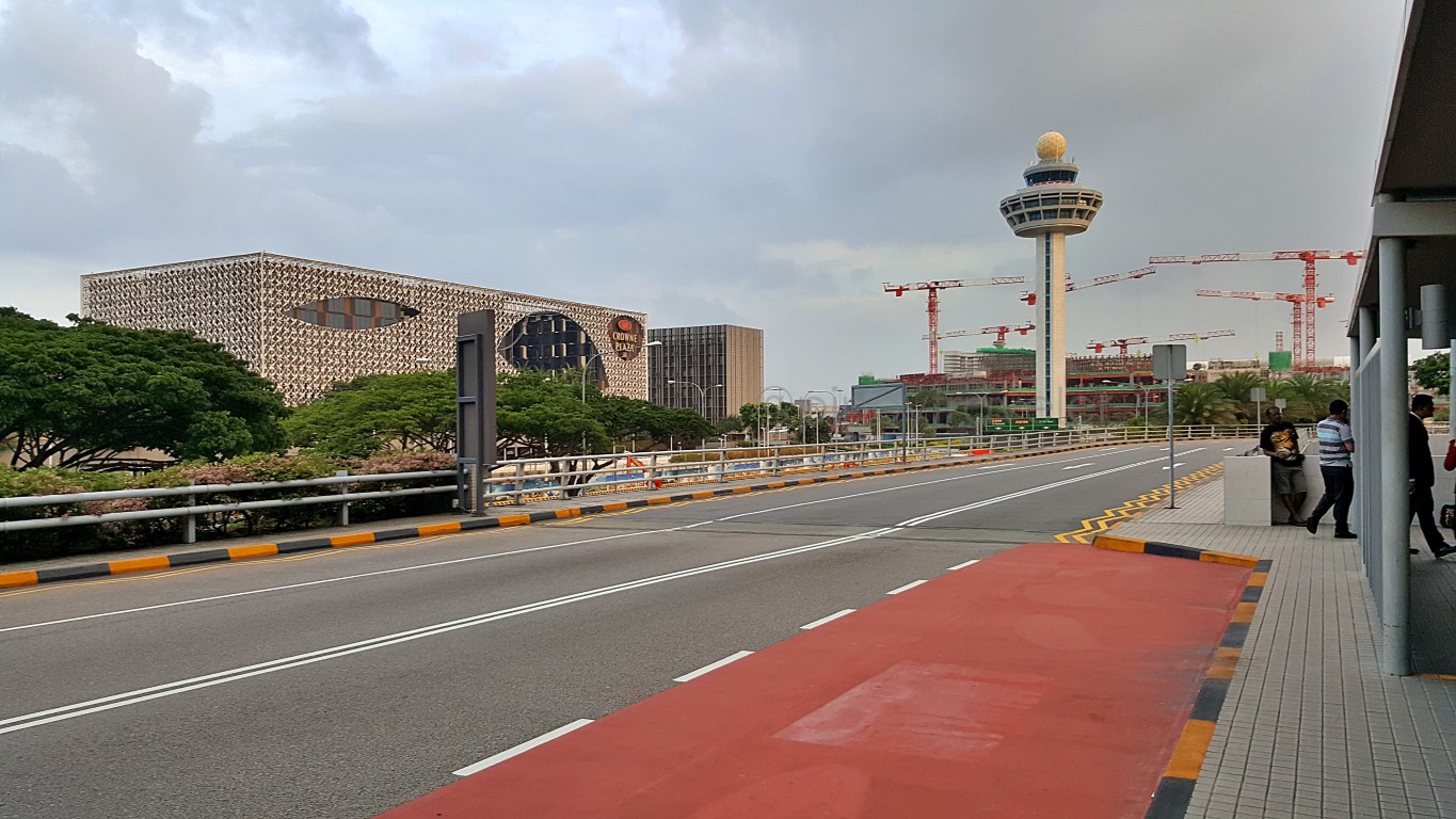 crowne plaza hotel and the original singapore airport control tower viewed from terminal 1 departure curbside