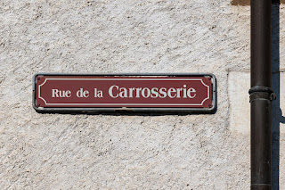Strassenschild zur Rue de la Carrosserie in Crans-près-Celigny