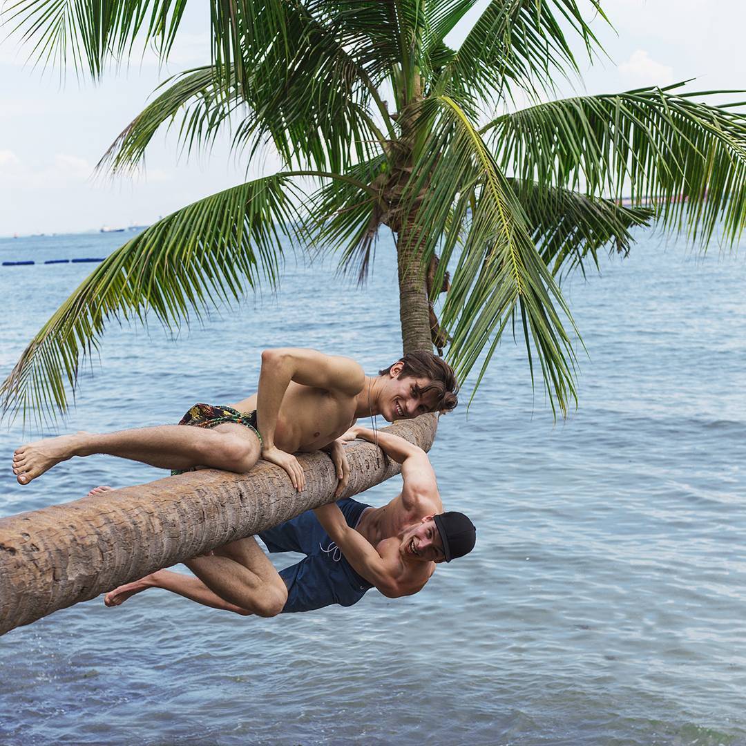 shirtless-fit-cute-young-gay-guys-coconut-tree-fun-summer