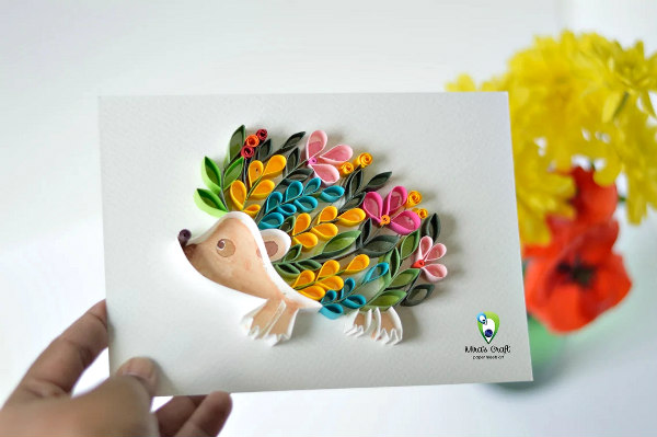 quilled hedgehog on-edge paper art features colorful paper flower body