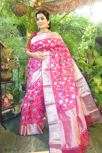 Falsa-colored pure zari Kota Doria saree.