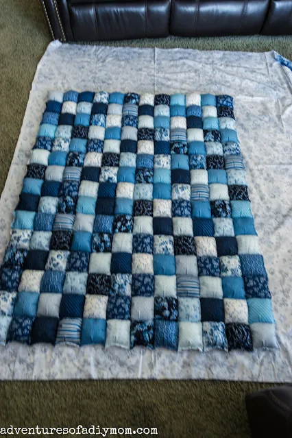 finished bubble quilt top on top of backing fabric