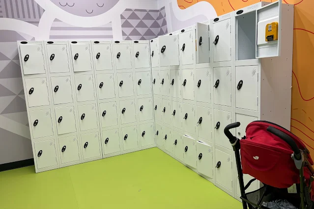 There are lockers which take one pound and an unsecured area for pushchairs at Nickelodeon Adventure