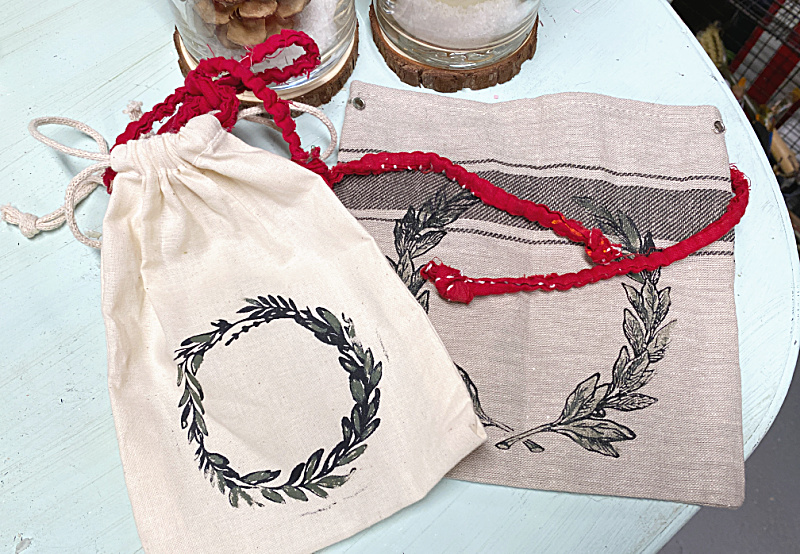 stenciled gift bags with wreaths