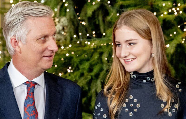 Crown Princess Elisabeth wore a crystal embellished jersey dress by Dries Van Noten. Princess Eleonore wore a stretch lurex fabric dress by Maje