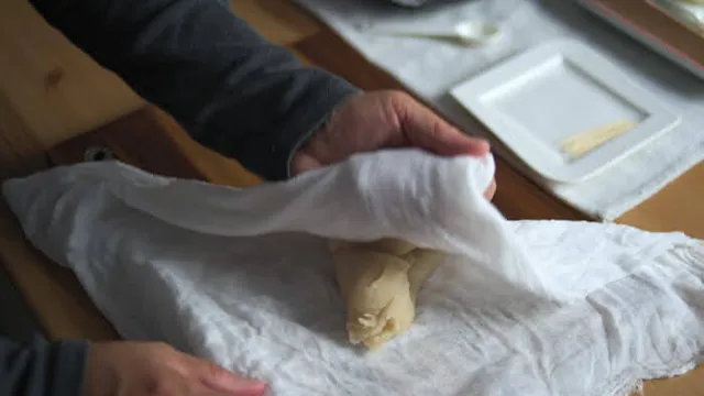 Stretch and fold in a damp cheese cloth for 20 times.