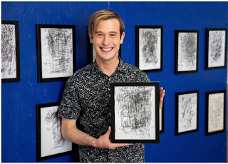 Tyler Henry with HIs Scribbles Rainbow City Learning