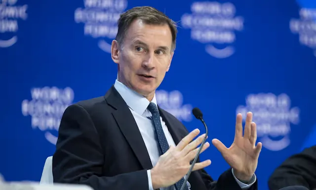 Jeremy Hunt, pictured at the World Economic Forum meeting in Davos, has come under pressure to cut taxes amid forecasts from the Office for Budget Responsibility. Photograph: Fabrice Coffrini/AFP/Getty Images