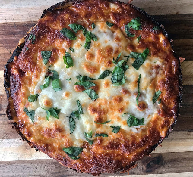 Cheese and basil pizza