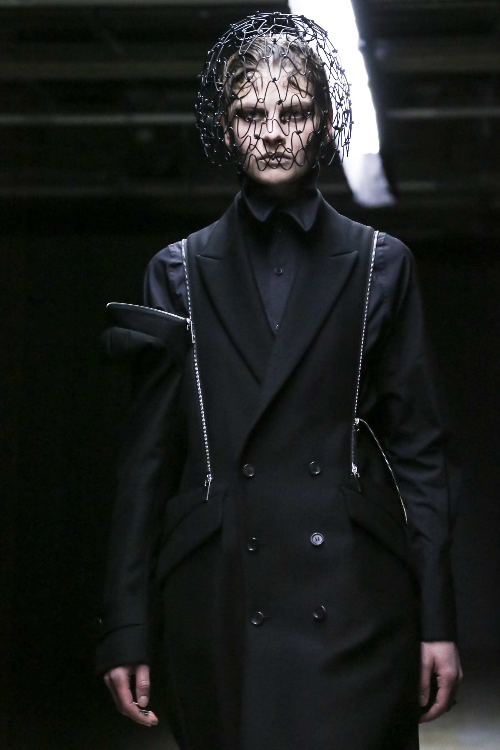 Image may contain Noir Kei Ninomiya Clothing Apparel Human Person Fashion Runway Long Sleeve and Sleeve