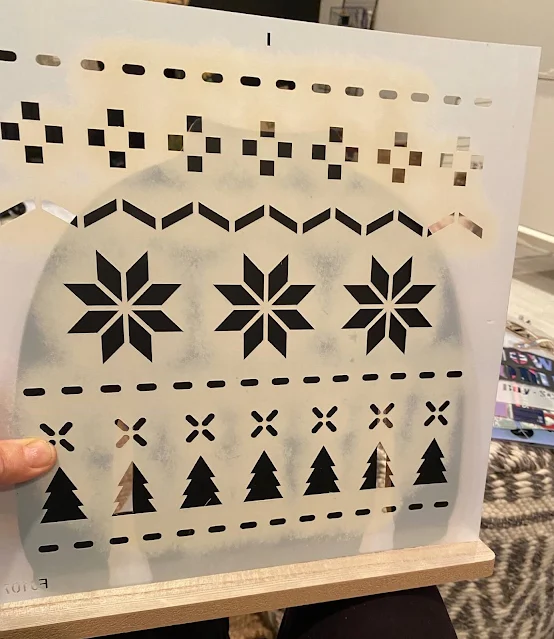 Photo of the Poinsettia Christmas Sweater stencil from Old Sign Stencils.