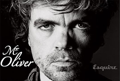 Peter Dinklage close up in black and white looking serious the caption says Mr. Oliver