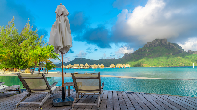 A stunning view of the crystal-clear ocean with vibrant shades of blue and turquoise.