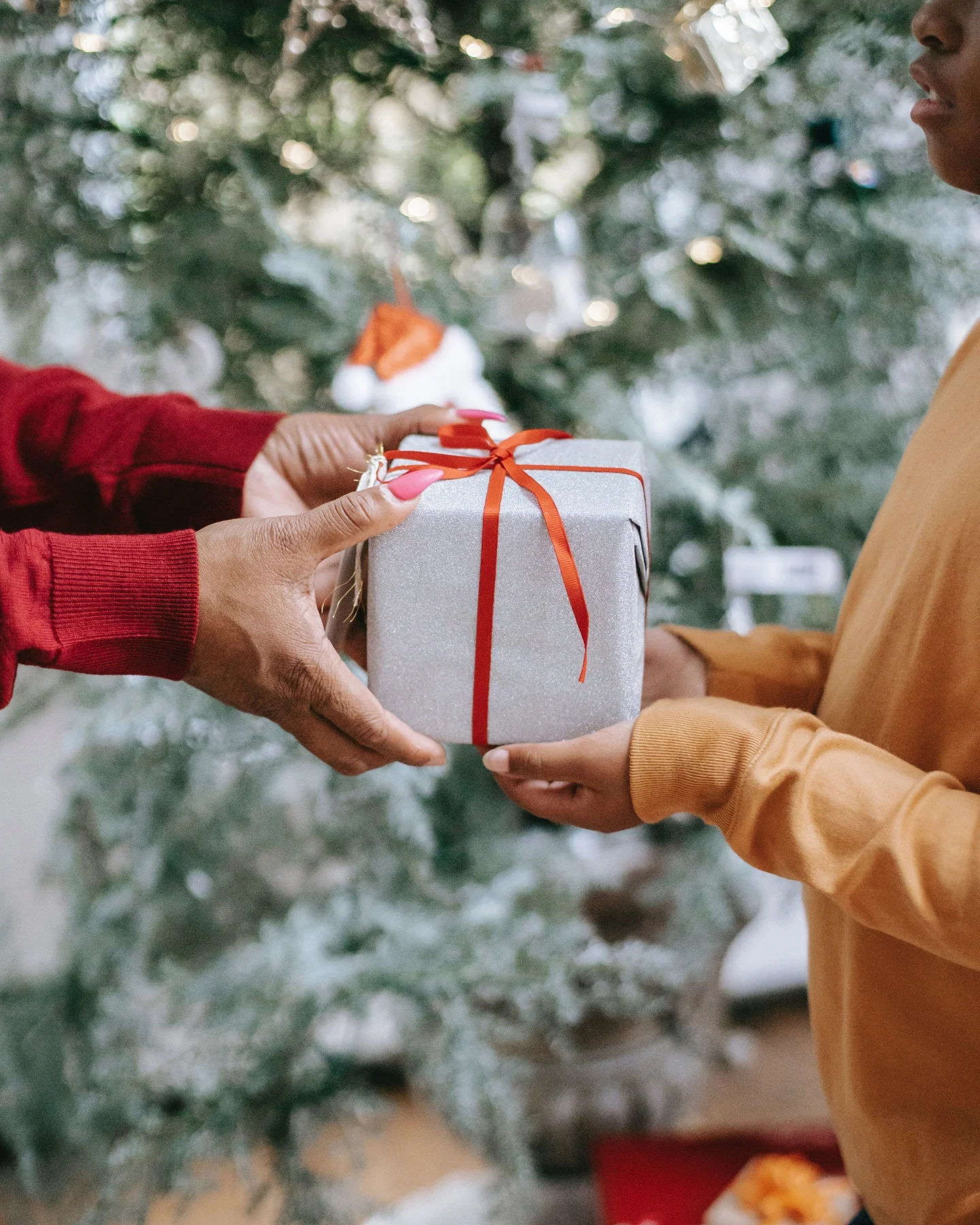 Lady giving presenting a gift