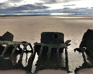 A photo of the skeletal and rusting remains of one of the submarines with the metal ribs of the vessel on show.  Photograph by Kevin Nosferatu for the Skulferatu Project.