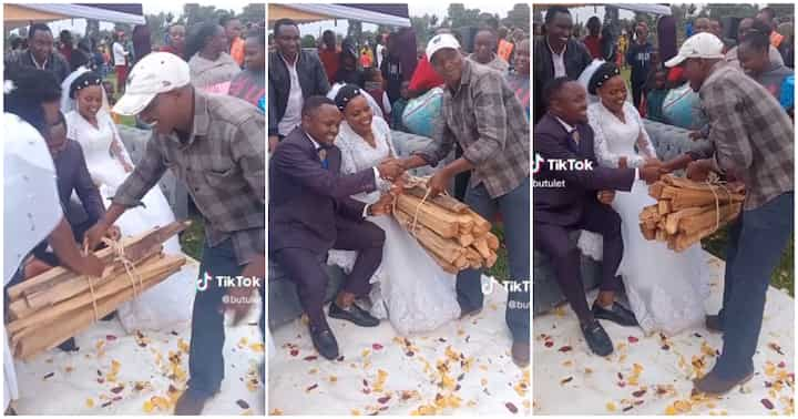 Use It To Cook Food For Your Husband, See Hilarious Moment Man Gifts Couples Firewood On Their Wedding Day (Video)
