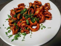 Masala squid fry in a serving plate