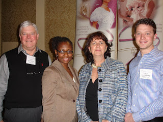 Wedding Gown Specialists Annual Meeting in Las Vegas. Representatives from Janet Davis Cleaners pose with speakers at meeting.