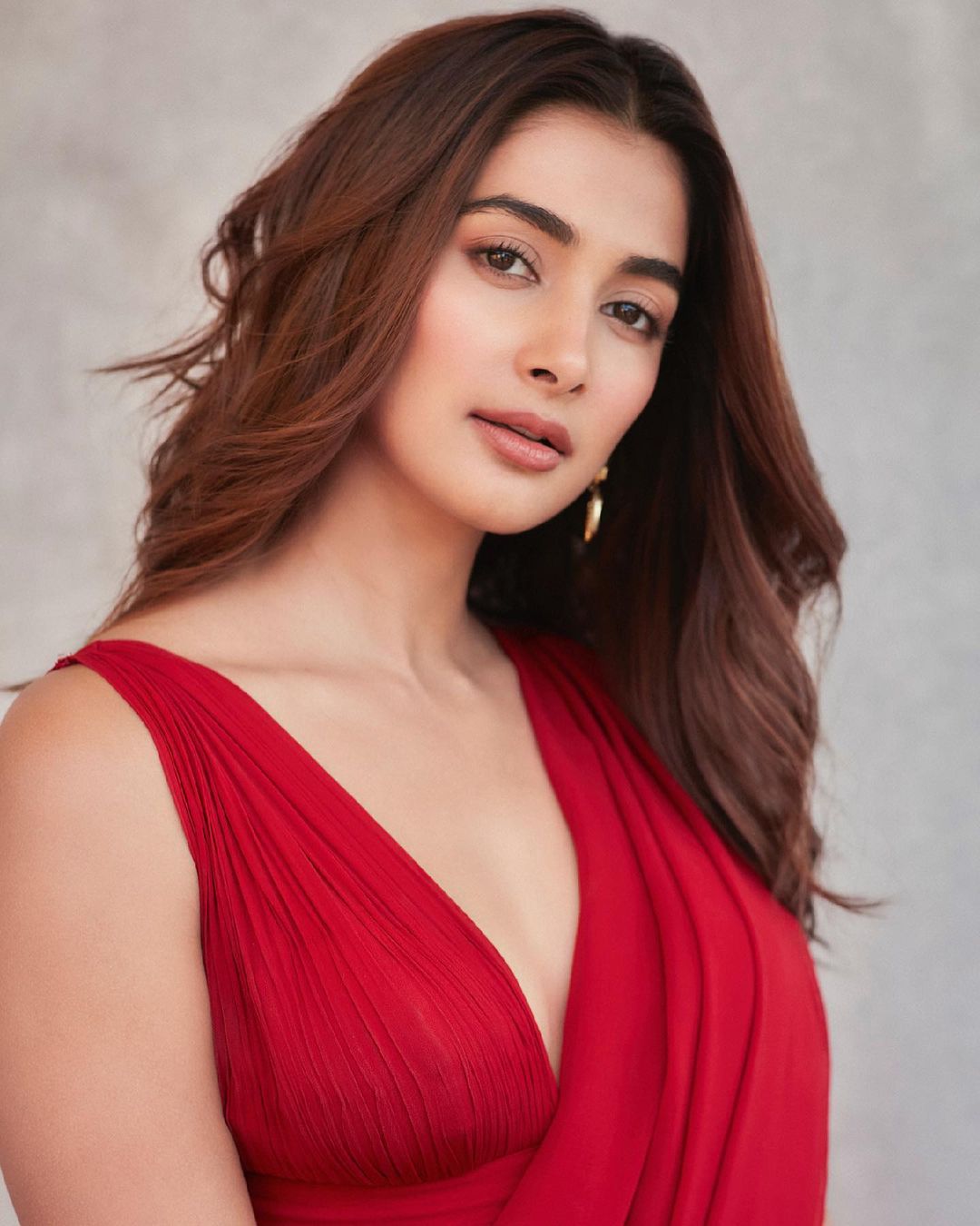 Bollywood Actress Pooja Hegde dazzles in a red ruffle saree worth ₹55k