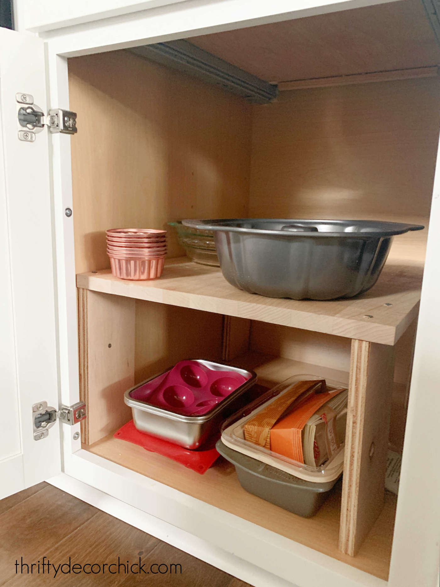 simple wood shelf inside cabinets