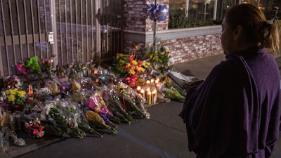 Image #1 for David Butow Photographs Star Ballroom Shooting Memorials and Resilience for CNN