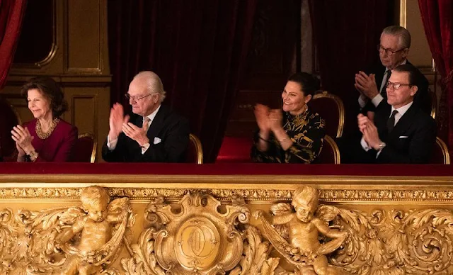 King Carl Gustaf, Queen Silvia, Crown Princess Victoria and Prince Daniel. Princess Victoria wore a gold flower dress by Dagmar