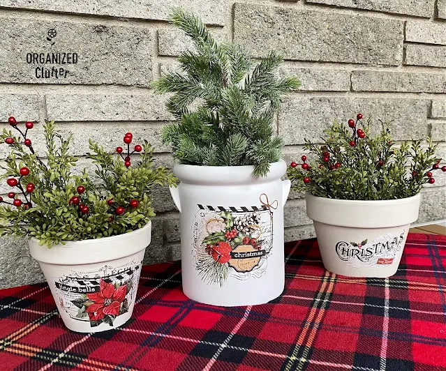 Photo of a crock & 2 chalk painted pots with Christmas decor transfers.
