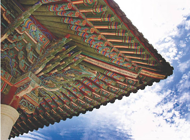 Dancheong of Naejangsa Temple. Faded dancheong reveals the grain of wood.