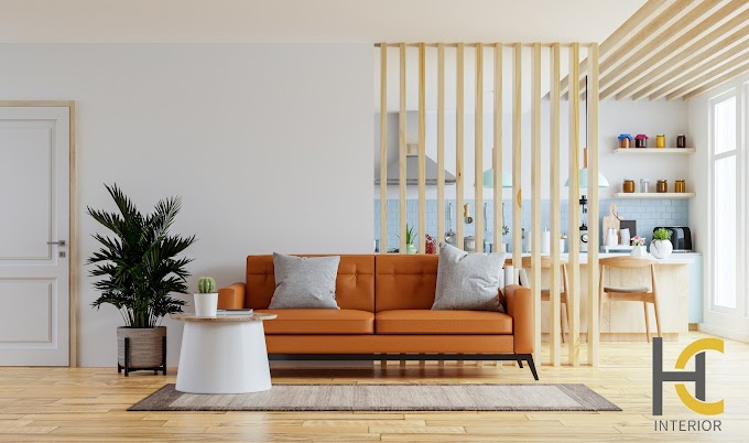 Living room interior wall mockup in warm tones with leather sofa which is behind the kitchen