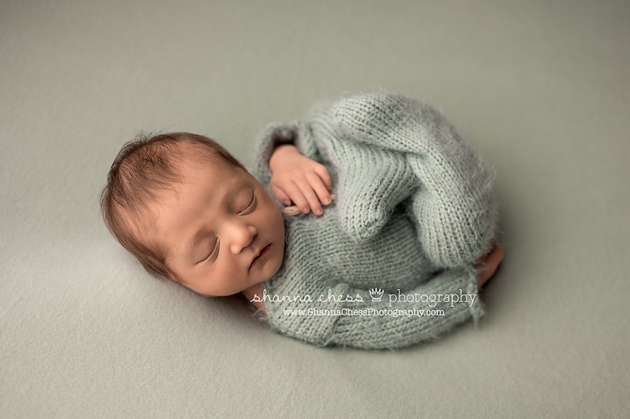 Infant boy asleep in Eugene Oregon newborn photo studio