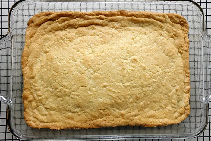 baked sugar cookie bars in glass pan