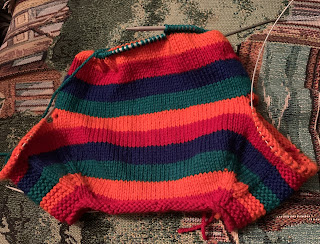 The in progress sweater, upside down. The body is quite a bit longer than the last photo shown.