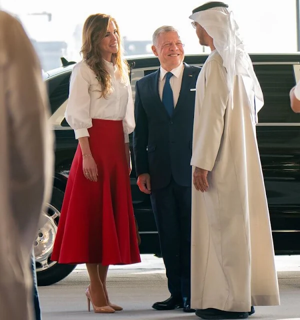 Queen Rania wore a ruth wool-crepe red midi skirt from Emilia Wickstead. The 2022 Zayed Award for Human Fraternity