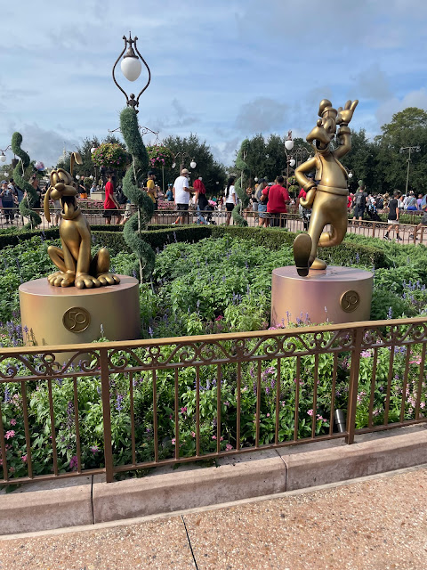 Pluto and Goofy Golden Statues 50th Anniversary of Walt Disney World Magic Kingdom