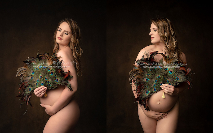 Pregnant woman posing for maternity pictures with peacock feathers in Eugene, Oregon photo studio