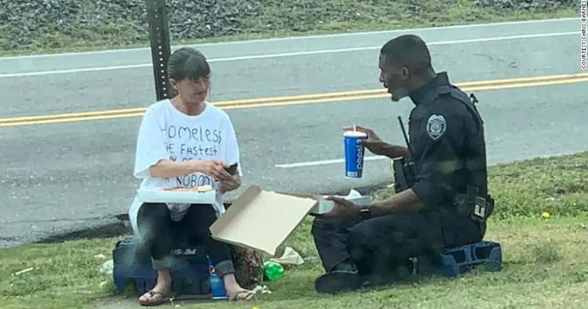 Police Officer Shares Pizza With Homeless Woman During His Lunch Break