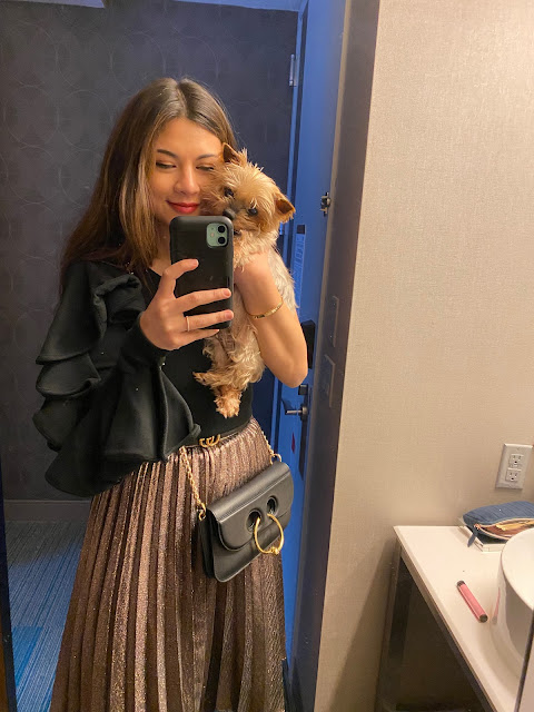 Kelly Fountain and her puppy at New York Fashion Week