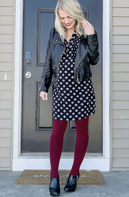 Cranberry tights with a dress and moto jacket