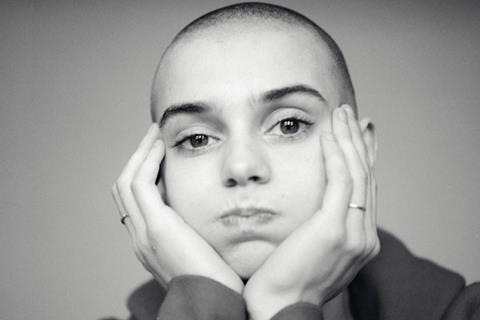 A black and white photo of Sinead O'Connor