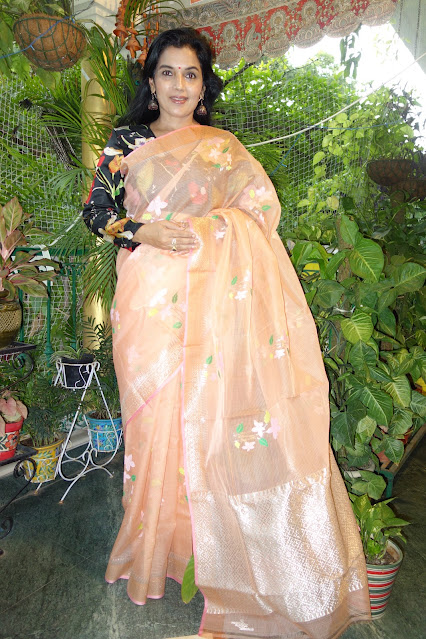 Peach Kota Doria Saree with flower motifs