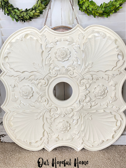 white fireplace medallion French detailing