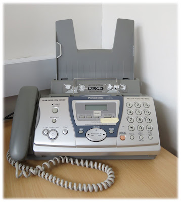 Panasonic fax machine on a desk